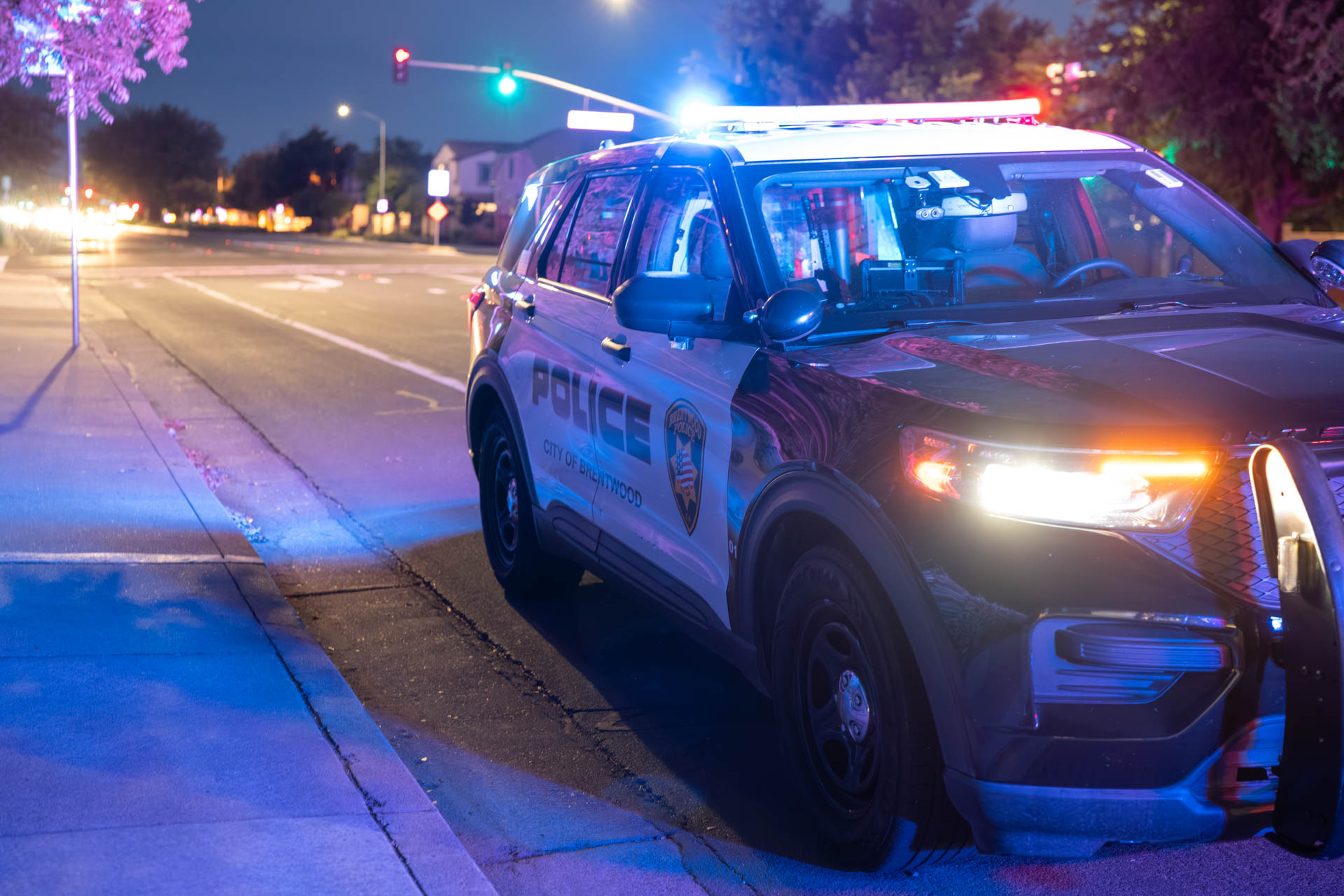 Brentwood patrol SUV parked on a city street at night